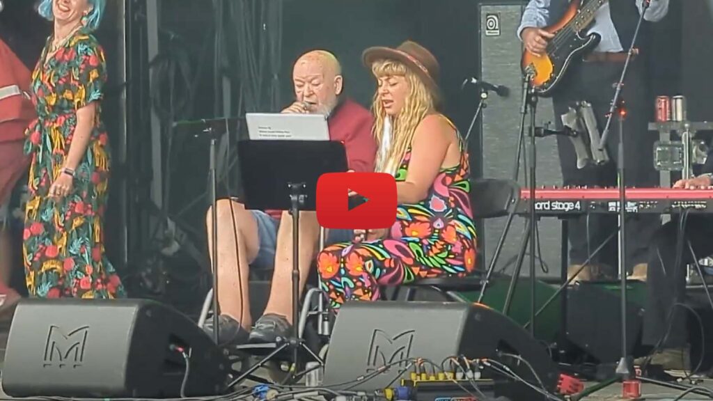 Michael Eavis singing at Glastonbury 2024